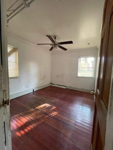 817 Southard St, Baldwin, NY 11510 - empty room with ornamental molding, hardwood / wood-style flooring, baseboards, and a ceiling fan
