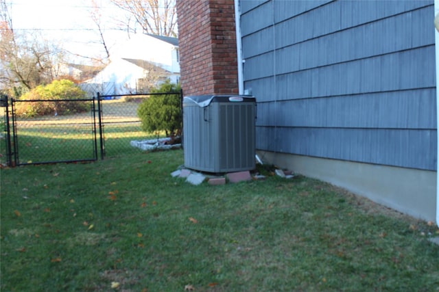 view of yard with central AC