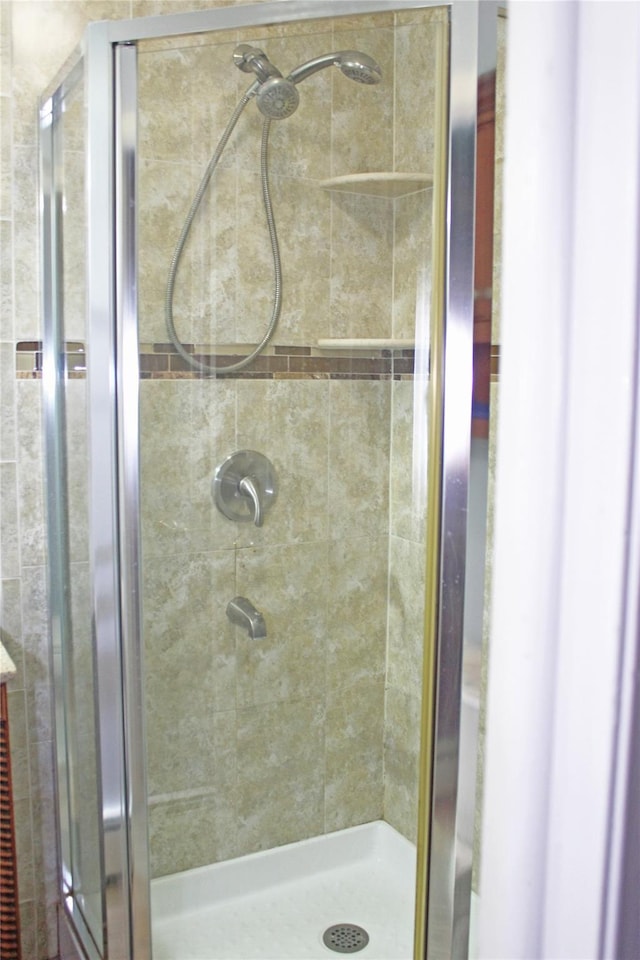 bathroom with an enclosed shower