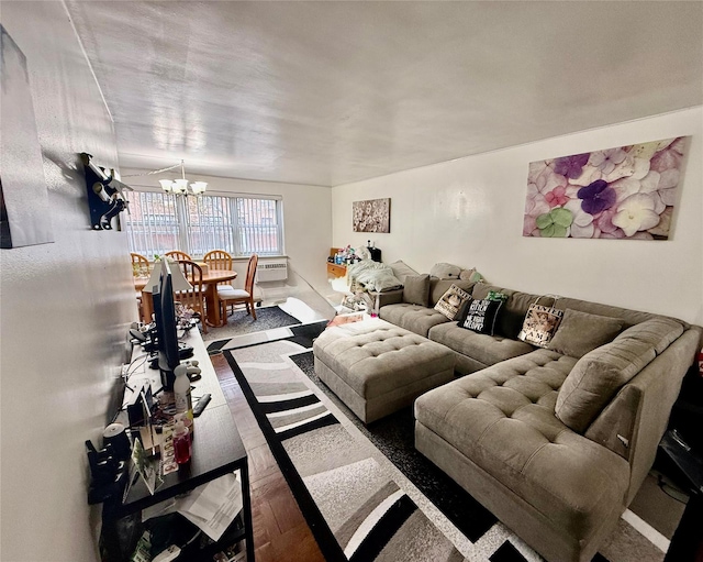 living room featuring hardwood / wood-style floors and a chandelier