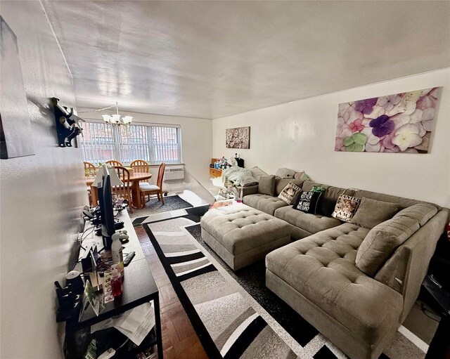 153-25 88th St Unit 1K, Howard Beach, NY 11414 - living area featuring a chandelier and wood finished floors