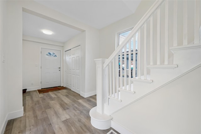 entrance foyer featuring light wood-type flooring