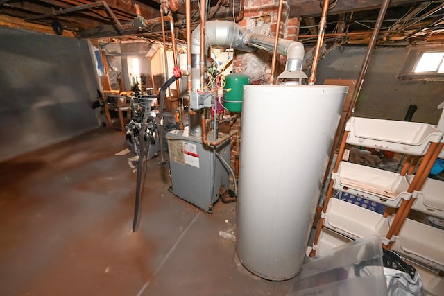 651 Madison Ave, Lindenhurst, NY 11757 - utility room with water heater and a heating unit