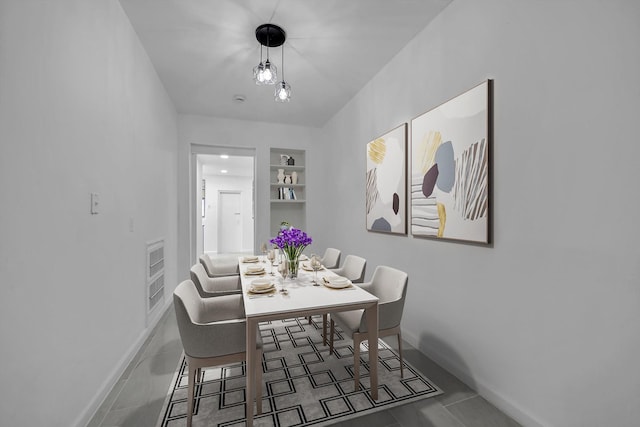 tiled dining room with built in features