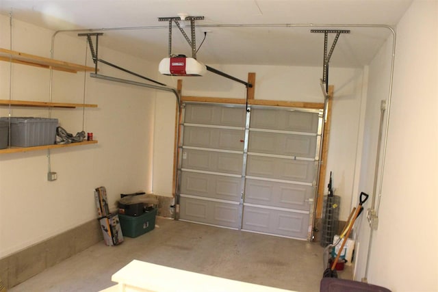 garage featuring a garage door opener