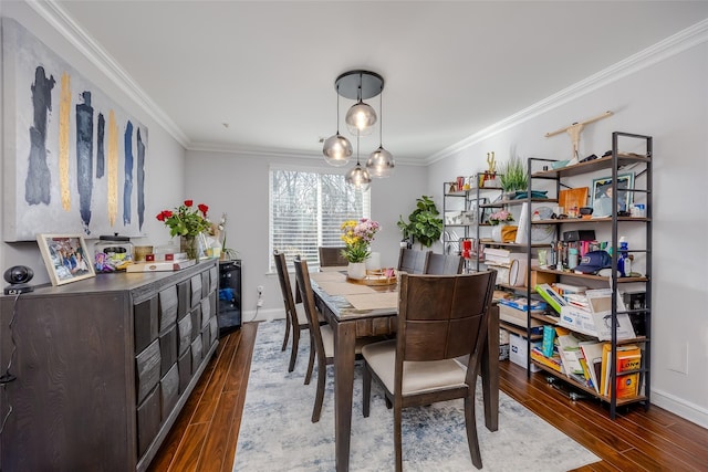 dining area with crown molding and dark hardwood / wood-style flooring