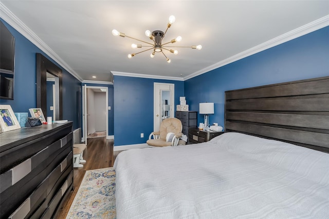 bedroom with crown molding, dark hardwood / wood-style flooring, and a notable chandelier