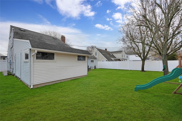 view of yard with a playground