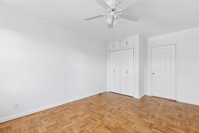 unfurnished bedroom featuring ceiling fan, light parquet floors, and ornamental molding