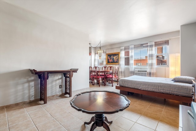 bedroom with light tile patterned floors