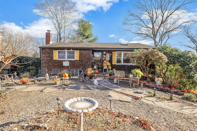 view of front of home featuring a patio