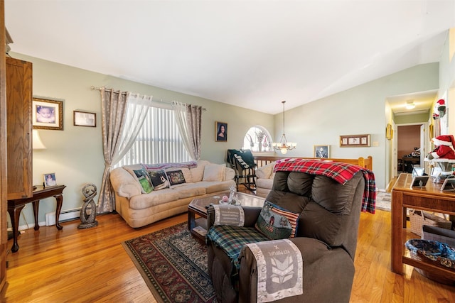 living room featuring a chandelier, a baseboard radiator, light hardwood / wood-style flooring, and lofted ceiling