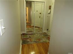 hall with light hardwood / wood-style flooring