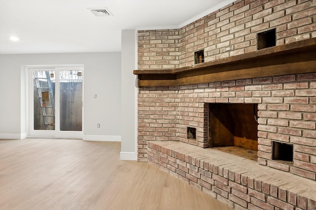 unfurnished living room featuring light hardwood / wood-style flooring