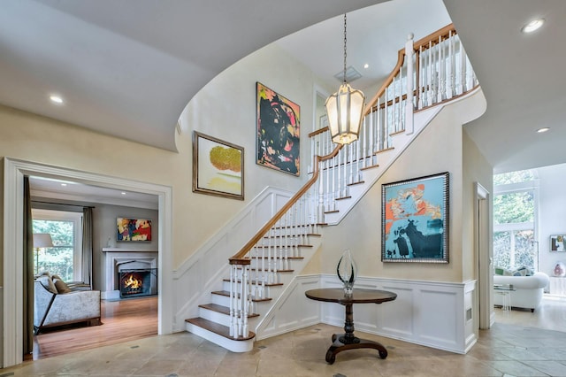 stairway featuring a wealth of natural light