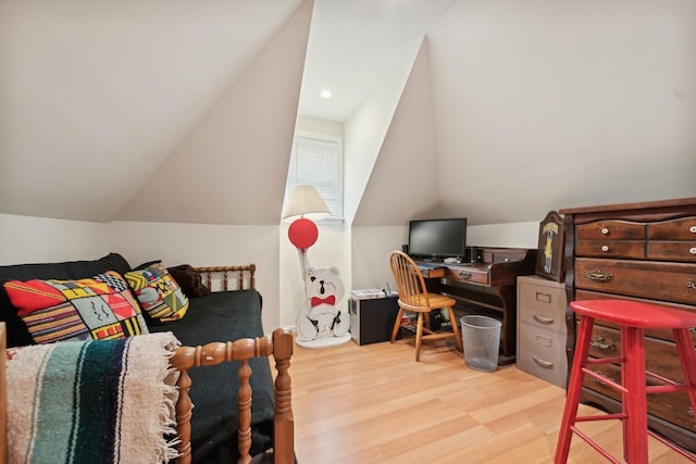 office featuring light hardwood / wood-style flooring and lofted ceiling