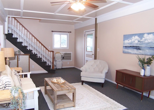 carpeted living room with a wall unit AC and ceiling fan