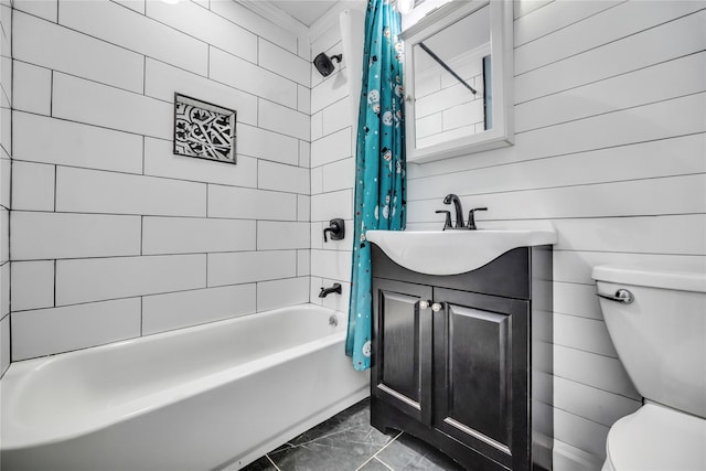 full bathroom featuring vanity, toilet, shower / bath combo with shower curtain, and crown molding