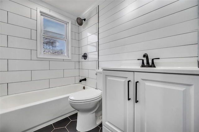 full bathroom featuring wooden walls, toilet, vanity, and tiled shower / bath