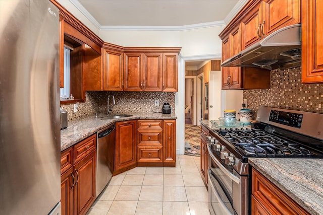 kitchen with decorative backsplash, appliances with stainless steel finishes, ornamental molding, sink, and light tile patterned floors