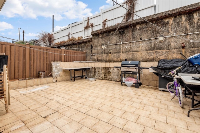 view of patio featuring grilling area