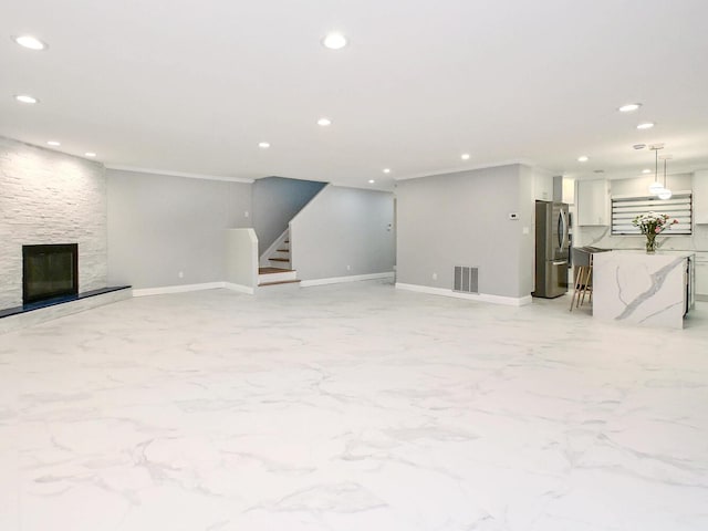 unfurnished living room with a fireplace