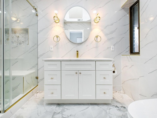 bathroom featuring vanity, a shower with door, toilet, and tile walls