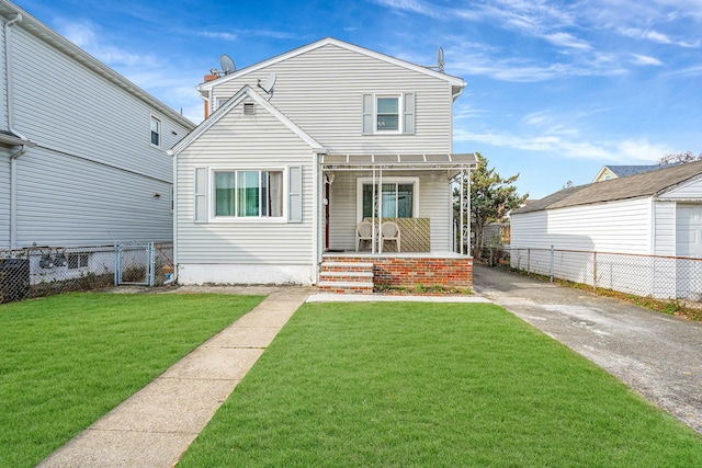 view of front of property with a front lawn