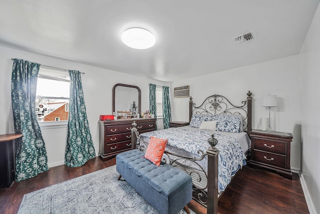 bedroom featuring dark hardwood / wood-style floors