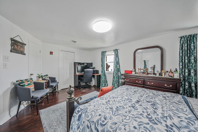 bedroom featuring dark hardwood / wood-style floors