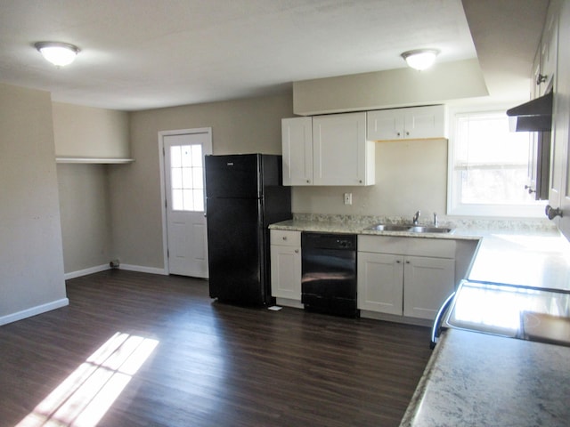 kitchen featuring black appliances, dark hardwood / wood-style flooring, white cabinets, and sink