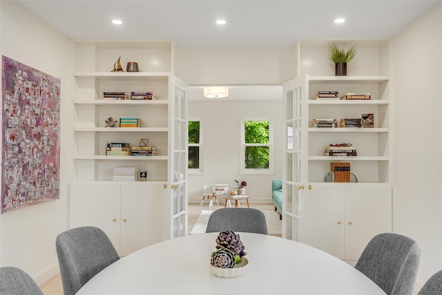 dining room with baseboards, french doors, and recessed lighting