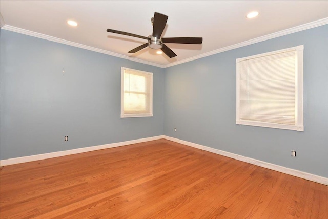 unfurnished room with ceiling fan, ornamental molding, and light wood-type flooring