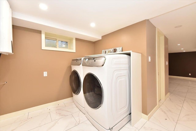 washroom featuring independent washer and dryer