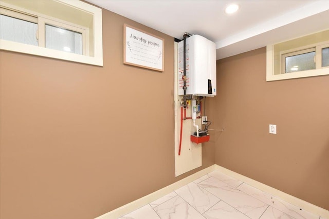 washroom with water heater