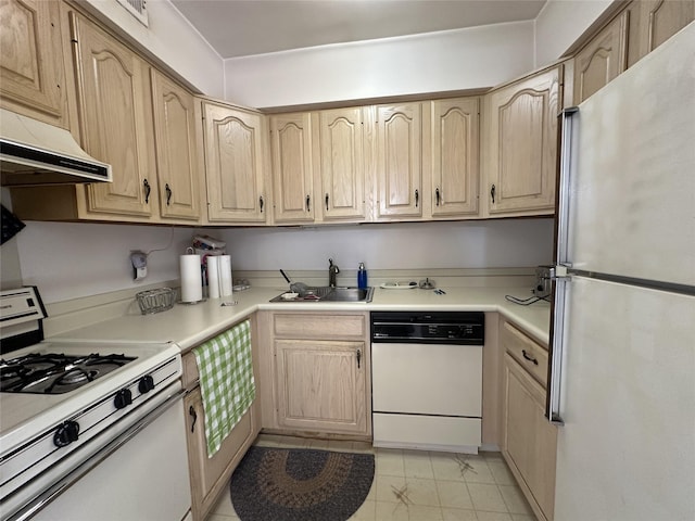 kitchen with light brown cabinets, white appliances, sink, and extractor fan