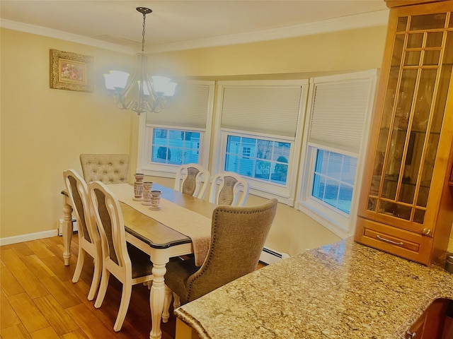 dining area featuring light hardwood / wood-style floors, a baseboard radiator, crown molding, and a chandelier