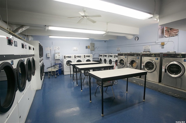 laundry area with washing machine and clothes dryer, stacked washer / dryer, ceiling fan, and electric panel