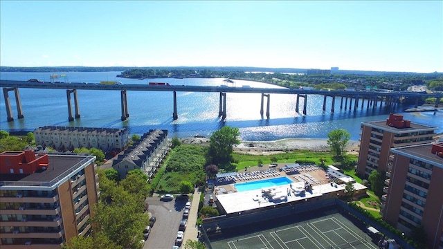 birds eye view of property with a water view