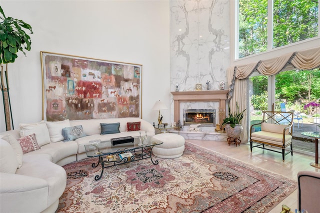 45 Bristol Dr, Manhasset, NY 11030 - living area with a high ceiling and a fireplace