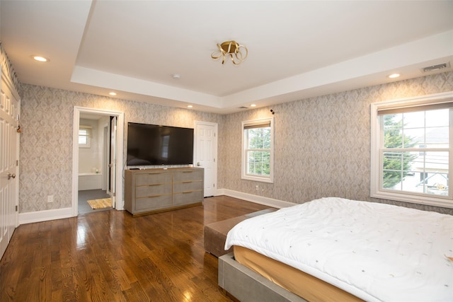 8 Lillian Ln, Plainview, NY 11803 - bedroom featuring wood finished floors, wallpapered walls, recessed lighting, a raised ceiling, and ensuite bath