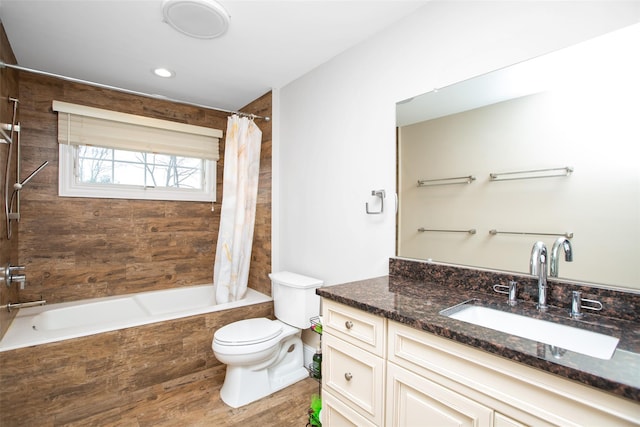 full bathroom with shower / tub combo, vanity, toilet, and wood-type flooring