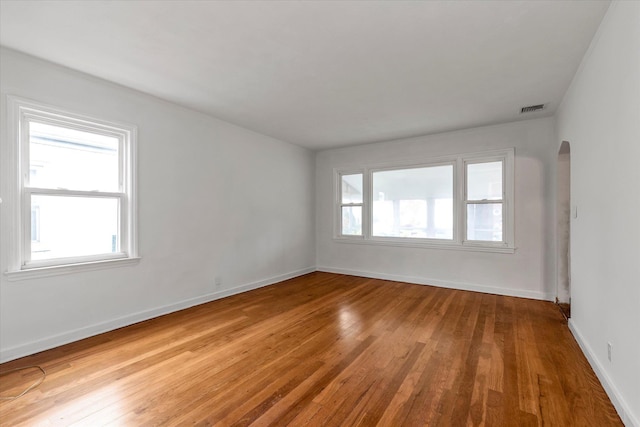 unfurnished room featuring light hardwood / wood-style flooring