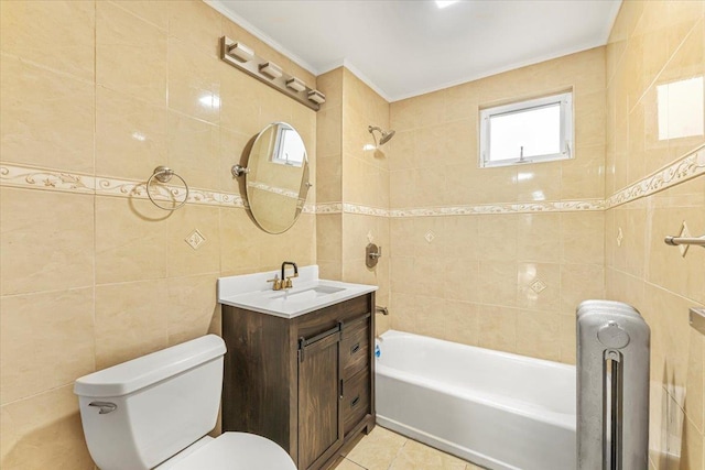 full bathroom with vanity, tile patterned flooring, toilet, tile walls, and radiator heating unit