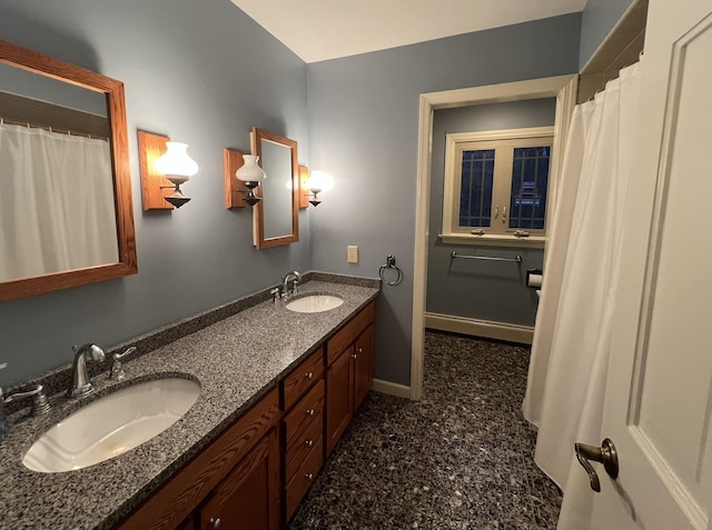 bathroom featuring vanity and a baseboard radiator