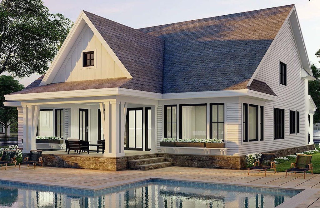 rear view of house with french doors and a patio