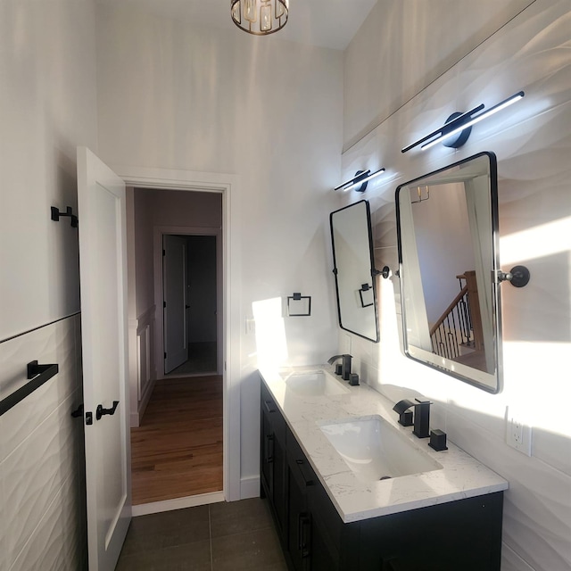 bathroom with tile patterned floors and vanity