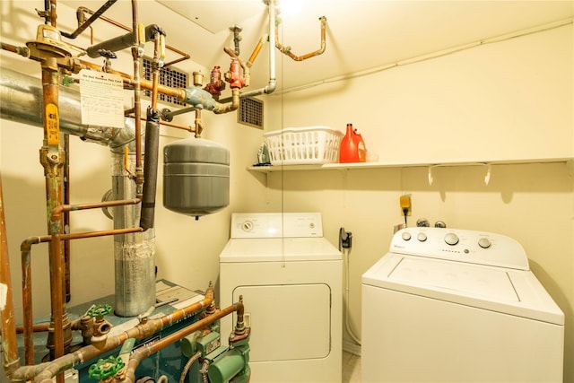 laundry area featuring independent washer and dryer