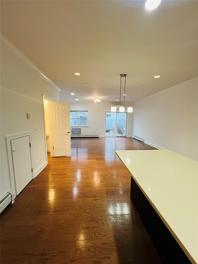 hallway featuring a baseboard heating unit, ornamental molding, and hardwood / wood-style flooring