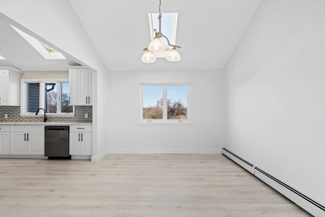 kitchen featuring white cabinets, tasteful backsplash, decorative light fixtures, a baseboard radiator, and dishwasher